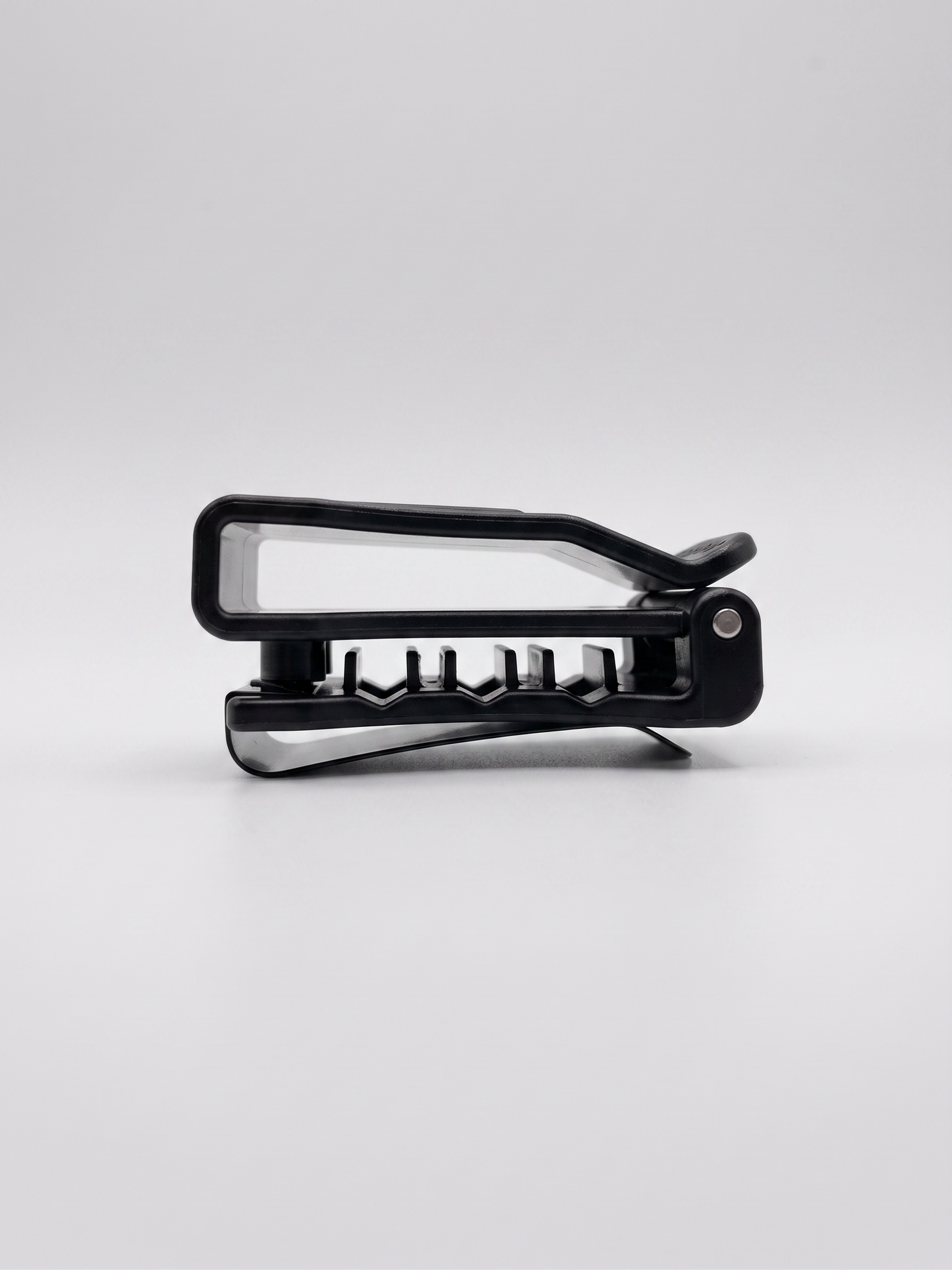 Black earmuff clip on a white background